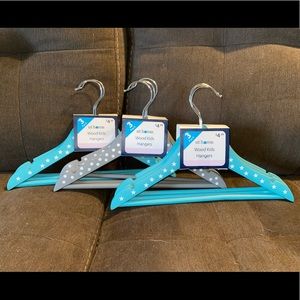 Wooden kids clothes hanger